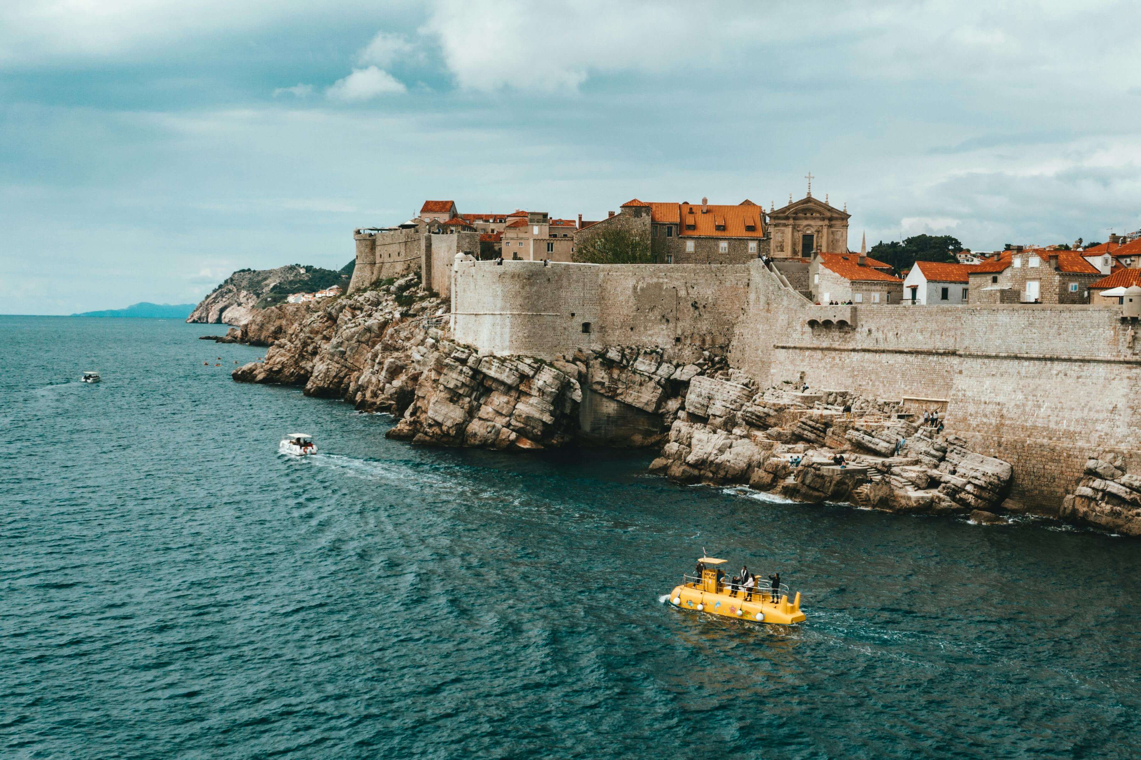 An image of dubrovnik's coastline by boat view
